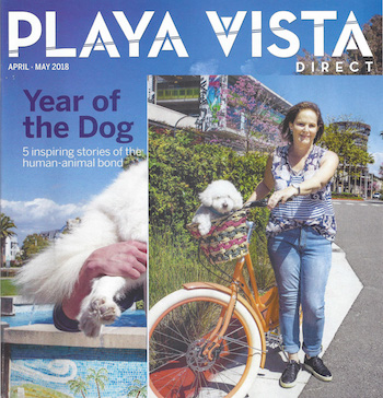 image of Sandra Heller with her dog Shayna on the cover of Play Vista news